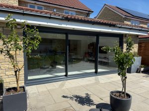 new aluminium triple track door